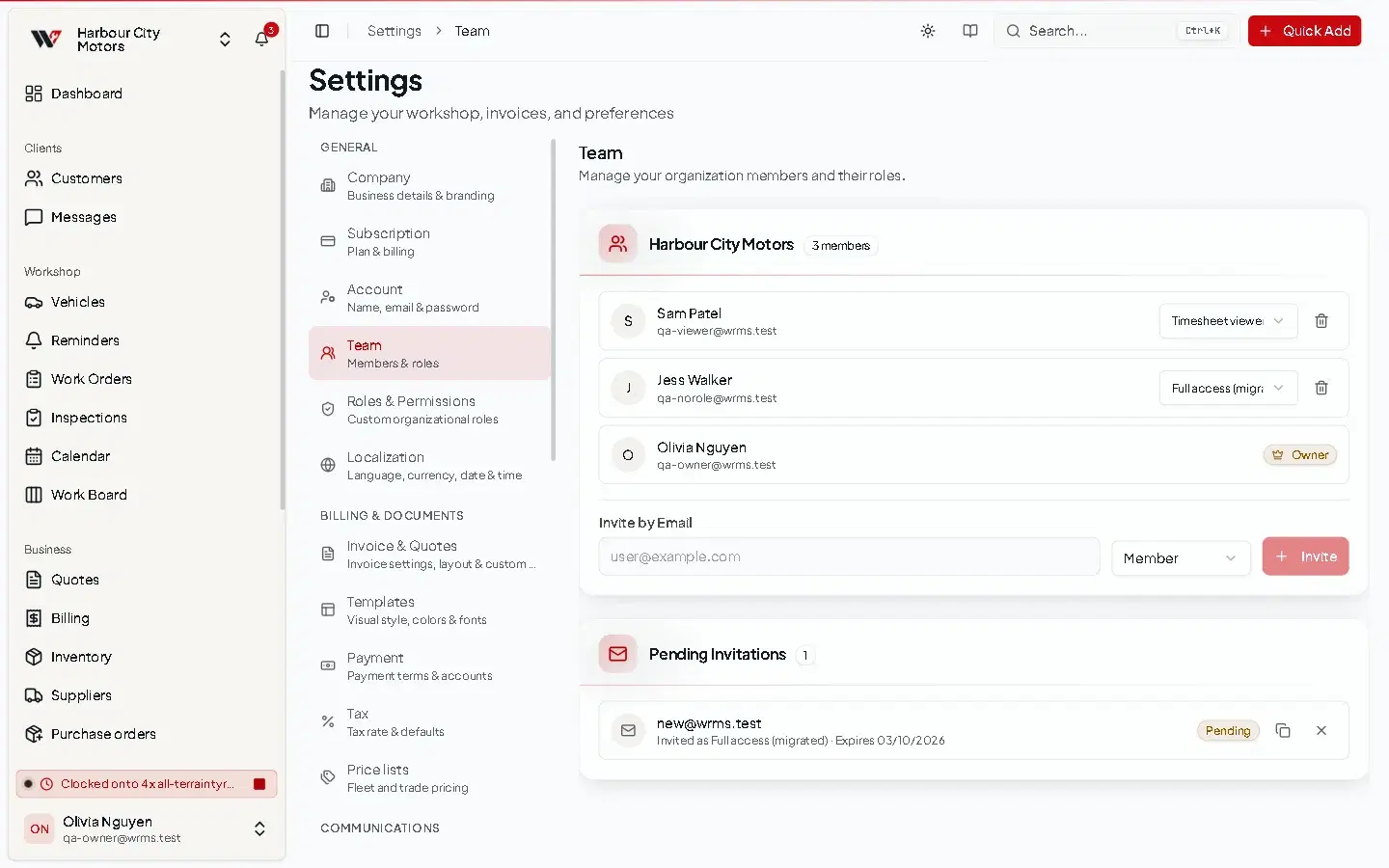 The Team settings page listing members with their role and an Invite button.